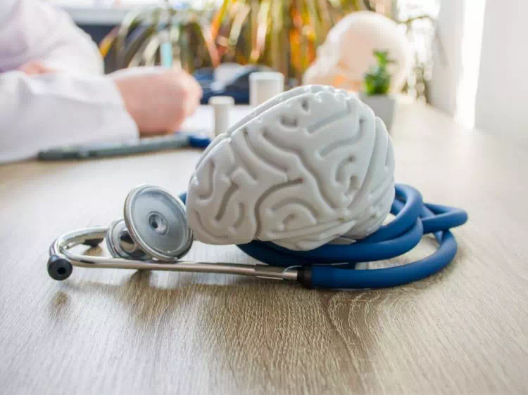 Stetoskop i model mózgu